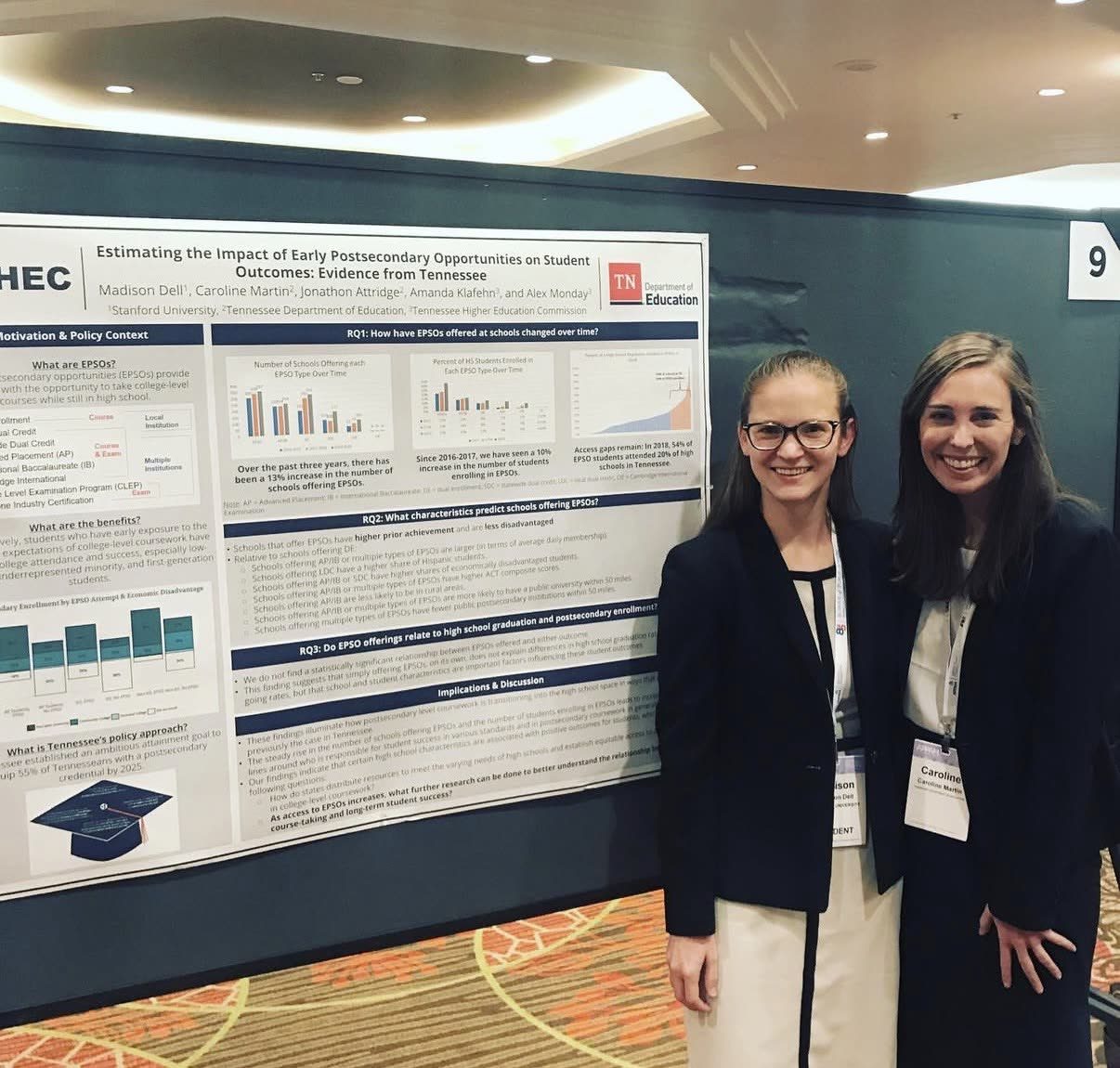 Caroline presenting research at a conference poster session